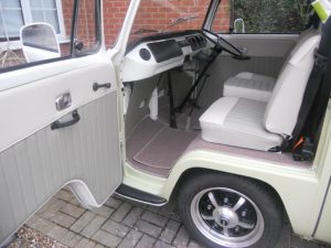 Lukes Pale Rider Campervan Bespoke Wood Cabinets Built in Sink Seat and Interior Retrim CCR Auto Trim